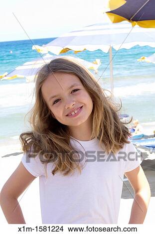 Portrait of a girl on the beach View Large Photo Image Picture - Portrait of a girl on the beach. Fotosearch