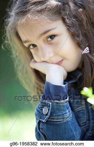 Stock Image - Portrait of a girl.. Fotosearch