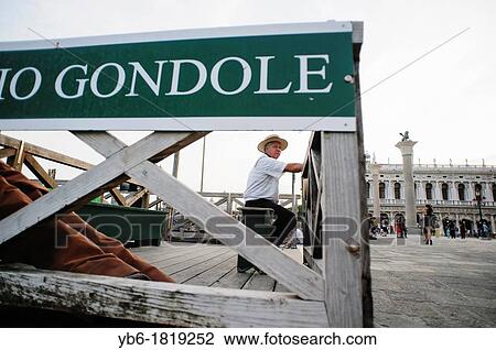 Portrait of a Gondolier waiting for customers by St Mark's Square, Venice, Italy View Large Photo Image Stock Image - Portrait of a Gondolier waiting for customers by St Mark's Square, Venice, Italy. Fotosearch