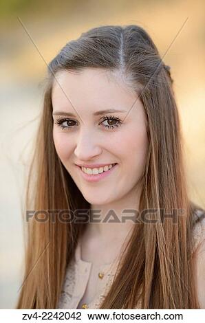 Portrait of a good looking young woman in early spring. View Large Photo Image Stock Image - Portrait of a good looking young woman in early spring.. Fotosearch