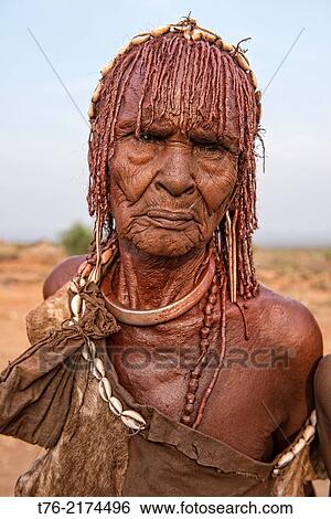 portrait of a Hamer woman near Turmi, Omo Valley, Ethiopia. View Large Photo Image Stock Photograph - portrait of a Hamer woman near Turmi, Omo Valley, Ethiopia.. Fotosearch