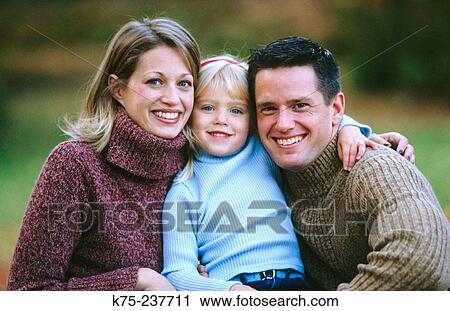 Stock Image - Portrait of a happy family. Fotosearch