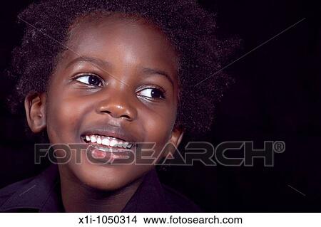 Portrait of a Happy Young Boy View Large Photo Image Picture - Portrait of a Happy Young Boy. Fotosearch