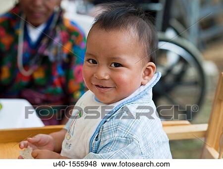 Stock Photo - Portrait of a Latin boy. Fotosearch