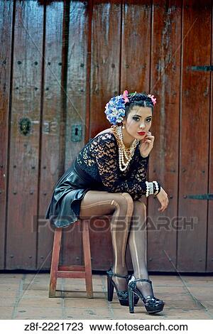 Portrait of a Latin woman inspired by the figure of Mexican painter Frieda Kahlo. View Large Photo Image Stock Image - Portrait of a Latin woman inspired by the figure of Mexican painter Frieda Kahlo.. Fotosearch