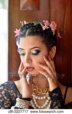 Portrait of a Latin woman inspired by the figure of Mexican painter Frieda Kahlo. View Large Photo Image Stock Photo - Portrait of a Latin woman inspired by the figure of Mexican painter Frieda Kahlo.. Fotosearch