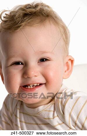 Stock Photo - Portrait of a little blond boy. Fotosearch
