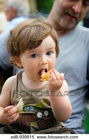Stock Photography - portrait of a little boy with his father. Fotosearch