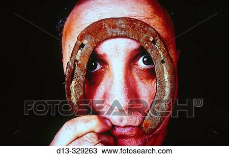 Portrait of a man with horseshoe View Large Photo Image Stock Image - Portrait of a man with horseshoe. Fotosearch