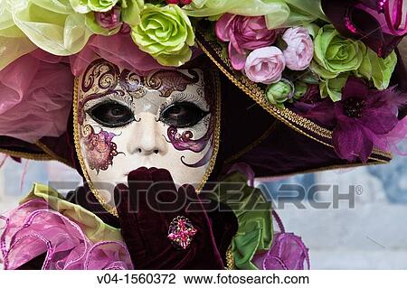 Portrait of a masked woman at the carnival in Venice, Italy, Europe View Large Photo Image Stock Image - Portrait of a masked woman at the carnival in Venice, Italy, Europe. Fotosearch