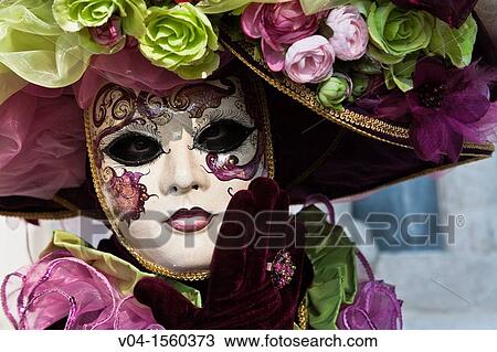 Portrait of a masked woman at the carnival in Venice, Italy, Europe View Large Photo Image Stock Image - Portrait of a masked woman at the carnival in Venice, Italy, Europe. Fotosearch