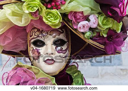 Portrait of a masked woman at the carnival in Venice, Italy, Europe View Large Photo Image Stock Photo - Portrait of a masked woman at the carnival in Venice, Italy, Europe. Fotosearch