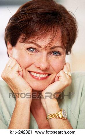 portrait of a middle-aged woman View Large Photo Image Stock Image - portrait of a middle-aged woman. Fotosearch
