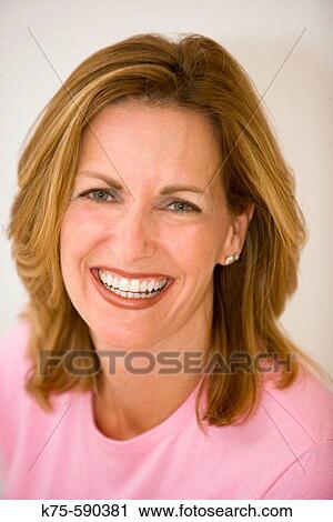 Portrait of a middle-aged woman. View Large Photo Image Stock Image - Portrait of a middle-aged woman.. Fotosearch