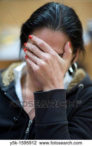 portrait of a middle-aged woman, holding a hand in front of her face. View Large Photo Image Stock Image - portrait of a middle-aged woman, holding a hand in front of her face.. Fotosearch