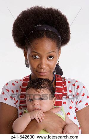 Portrait of a mother and baby. View Large Photo Image Stock Image - Portrait of a mother and baby.. Fotosearch
