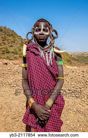 Portrait Of A Mursi Boy, Mursi Tribal Village, The Omo Valley, Ethiopia. View Large Photo Image Picture - Portrait Of A Mursi Boy, Mursi Tribal Village, The Omo Valley, Ethiopia.. Fotosearch