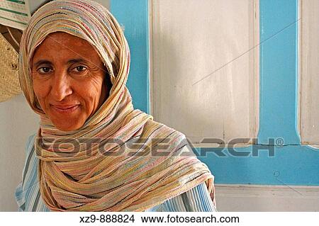 Portrait of a Muslim and Tunisian woman and her veil scarf View Large Photo Image Picture - Portrait of a Muslim and Tunisian woman and her veil scarf. Fotosearch
