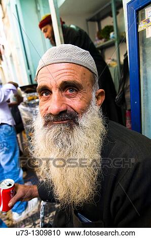 Portrait of a Muslim man taken in the old city of Jerusalem. View Large Photo Image Stock Image - Portrait of a Muslim man taken in the old city of Jerusalem.. Fotosearch