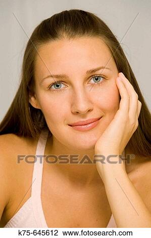 Portrait of a pretty young woman View Large Photo Image Stock Image - Portrait of a pretty young woman. Fotosearch