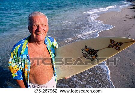 Portrait of a senior surfer View Large Photo Image Stock Image - Portrait of a senior surfer. Fotosearch