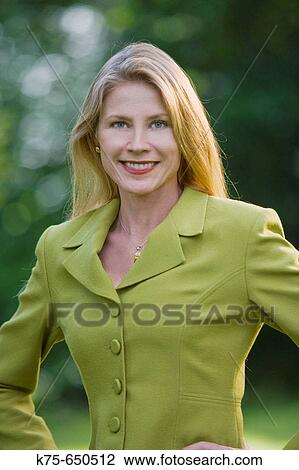 Stock Image - portrait of a smiling businesswoman. Fotosearch