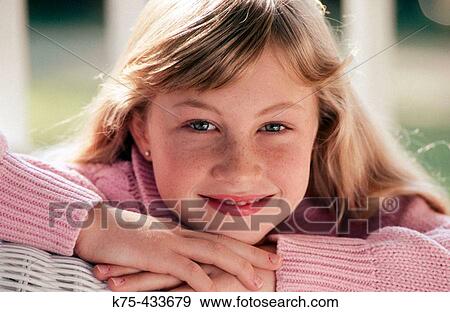 Portrait of a smiling pre-teen View Large Photo Image Stock Photo - Portrait of a smiling pre-teen. Fotosearch