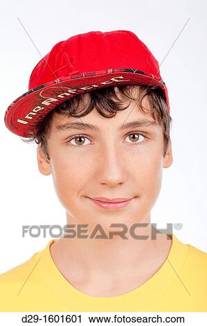 portrait of a teenage boy in red baseball cap -isolated on white View Large Photo Image Stock Image - portrait of a teenage boy in red baseball cap -isolated on white. Fotosearch