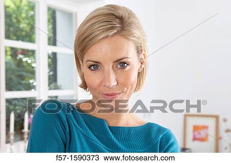 Portrait of a thirty year old woman at home View Large Photo Image Stock Image - Portrait of a thirty year old woman at home. Fotosearch