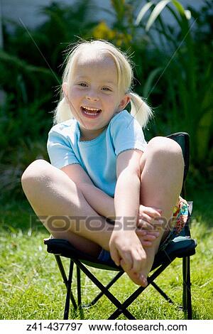 Portrait of a timid blond girl View Large Photo Image Stock Photo - Portrait of a timid blond girl. Fotosearch