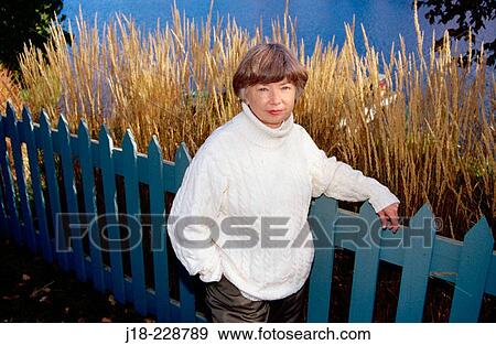 Stock Photo - Portrait of a woman, autumn. Gatineau Park. Quebec. Canada. Fotosearch