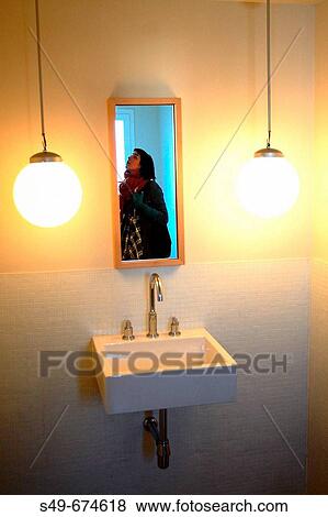 Portrait of a woman in the hotel bathroom, Madrid. Spain. View Large Photo Image Stock Photo - Portrait of a woman in the hotel bathroom, Madrid. Spain.. Fotosearch