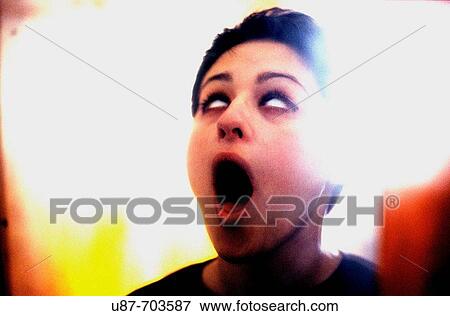 Portrait of a woman shouting View Large Photo Image Stock Photo - Portrait of a woman shouting. Fotosearch