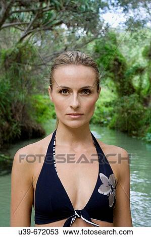 Portrait of a woman standing in a lagoon. Fraser Island, Australia View Large Photo Image Stock Image - Portrait of a woman standing in a lagoon. Fraser Island, Australia. Fotosearch