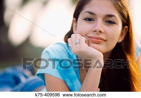 portrait of a young adult girl View Large Photo Image Stock Photograph - portrait of a young adult girl. Fotosearch