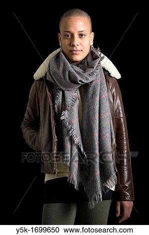 Portrait of a young, African immigrant to The Netherlands. This attractive woman has a caucasian Dutch father and a black African mother. View Large Photo Image Stock Image - Portrait of a young, African immigrant to The Netherlands. This attractive woman has a caucasian Dutch father and a black African mother.. Fotosearch