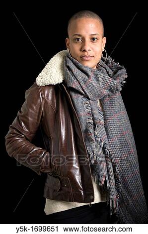 Portrait of a young, African immigrant to The Netherlands. This attractive woman has a caucasian Dutch father and a black African mother. View Large Photo Image Stock Image - Portrait of a young, African immigrant to The Netherlands. This attractive woman has a caucasian Dutch father and a black African mother.. Fotosearch