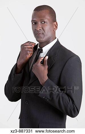 Portrait of a young black man View Large Photo Image Stock Image - Portrait of a young black man. Fotosearch
