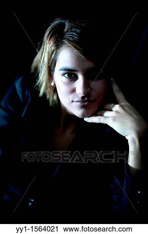 Portrait of a young brunette, taken in the studio. View Large Photo Image Stock Image - Portrait of a young brunette, taken in the studio.. Fotosearch