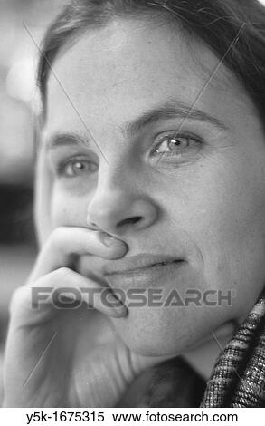 Portrait of a young, caucasian female, leaning on her right-hand. Scanned from black-and-white film. View Large Photo Image Stock Photography - Portrait of a young, caucasian female, leaning on her right-hand. Scanned from black-and-white film.. Fotosearch