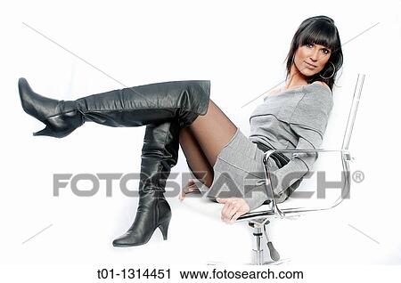 Portrait of a young fashioned woman View Large Photo Image Stock Image - Portrait of a young fashioned woman. Fotosearch