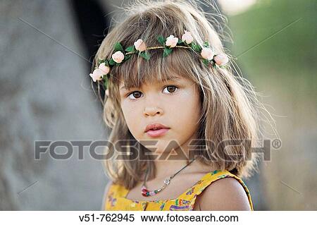 Portrait of a young girl in the countryside View Large Photo Image Stock Photography - Portrait of a young girl in the countryside. Fotosearch