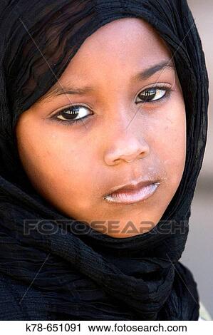Portrait of a young girl, Salalah. Oman. View Large Photo Image Stock Image - Portrait of a young girl, Salalah. Oman.. Fotosearch