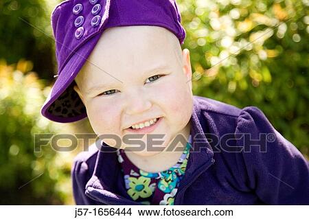 Portrait of a young girl with pediatric cancer leukaemia smiling at the camera She has just lost her hair after a strong dose of chemo therapy but is still managing to smile View Large Photo Image Picture - Portrait of a young girl with pediatric cancer leukaemia smiling at the camera She has just lost her hair after a strong dose of chemo therapy but is still managing to smile. Fotosearch