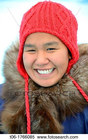 Portrait of a young inuit woman - 22 years old - Grise Fiord, Ellesmere island, Nunavut, Canada View Large Photo Image Stock Photography - Portrait of a young inuit woman - 22 years old - Grise Fiord, Ellesmere island, Nunavut, Canada. Fotosearch