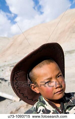 Portrait of a young Kyrgyz boy. View Large Photo Image Stock Photography - Portrait of a young Kyrgyz boy.. Fotosearch