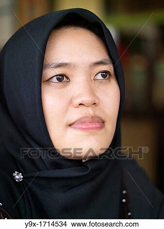 Portrait of a young Malaysian women View Large Photo Image Picture - Portrait of a young Malaysian women. Fotosearch