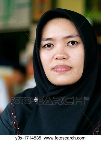 Stock Photography - Portrait of a young Malaysian women. Fotosearch