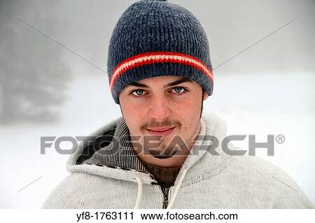 Portrait of a young man in a snowing mountain Spain View Large Photo Image Stock Image - Portrait of a young man in a snowing mountain Spain. Fotosearch