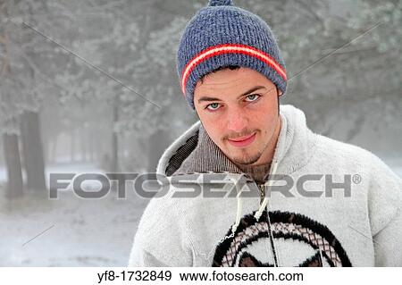 Portrait of a young man in a snowing mountain Spain View Large Photo Image Stock Photo - Portrait of a young man in a snowing mountain Spain. Fotosearch